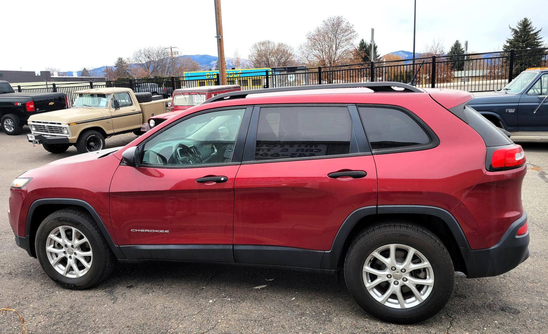 2016 Maroon /Tan Jeep Cherokee Sport (1C4PJMAB9GW) with an 2.4L I4 engine, 9 Speed Automatic transmission, located at 450 N Russell, Missoula, MT, 59801, (406) 543-6600, 46.874496, -114.017433 - Clean 4 Wheel Drive SUV. Air. Cruise. Tilt. Power Windows and Locks. Bluetooth. Backup Camera. - Photo#3